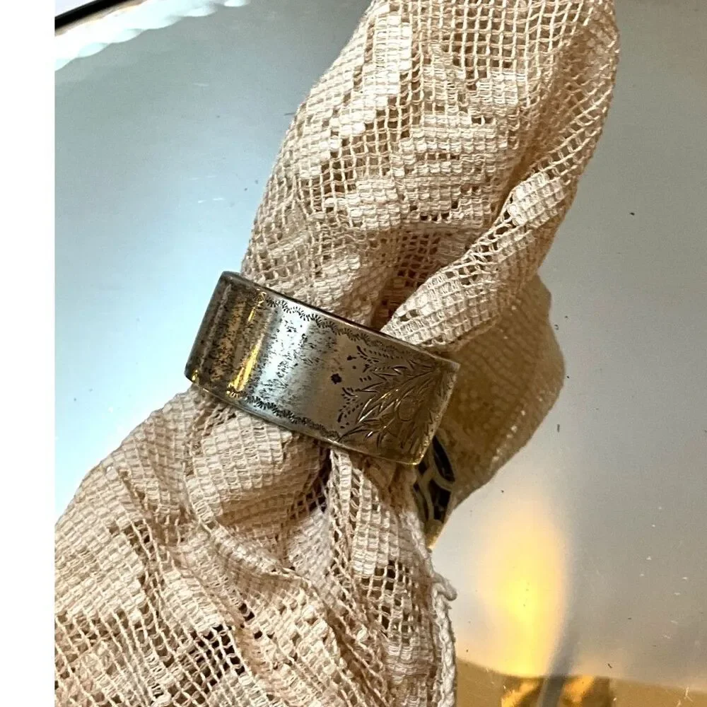 Stunning Sterling silver vintage napkin ring; open work front must see